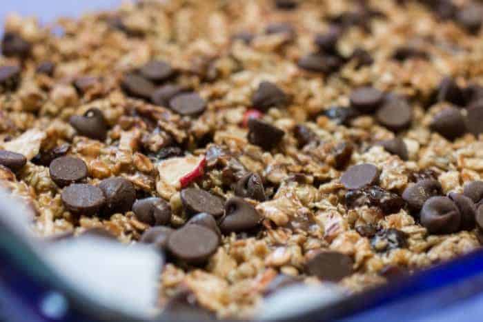 Chocolate Raisin Apple Granola Bars in a pan. Recipe Included