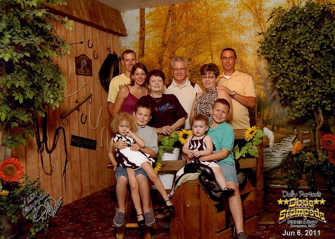 family portrait taken at Dolly Parton's Stampede in Branson, MO