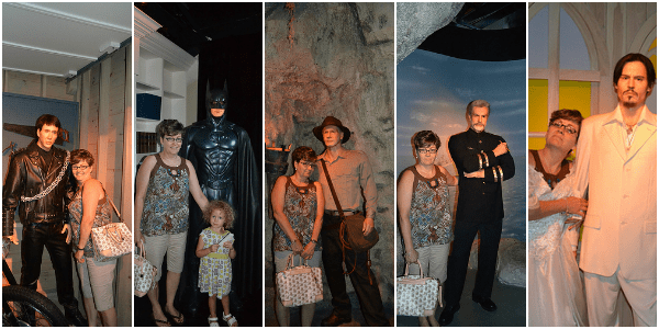 posing with Sean Connery, Nicolas Cage, Batman, Johnny Depp, and Harrison Ford wax figures at Hollywood Wax Museum Branson, MO
